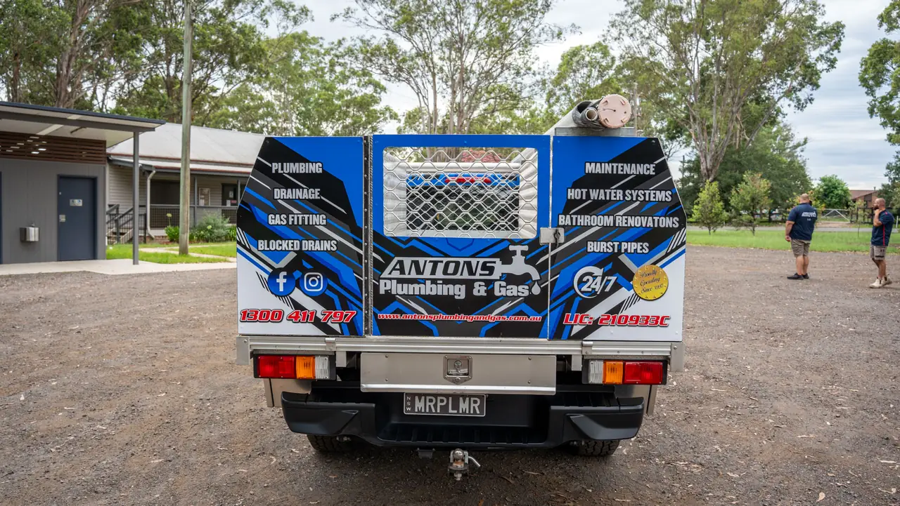Rear of an Antons service vehicle displaying gas fitting among its services